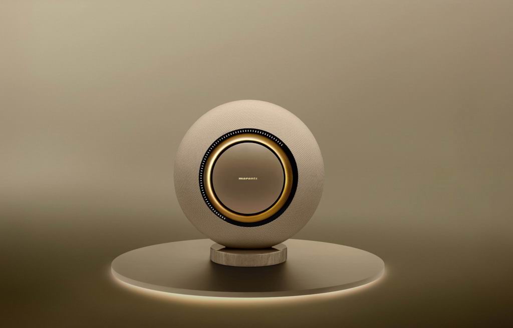 marantz-grand-horizon-speaker-champagne-speaker-on-a-table.jpg