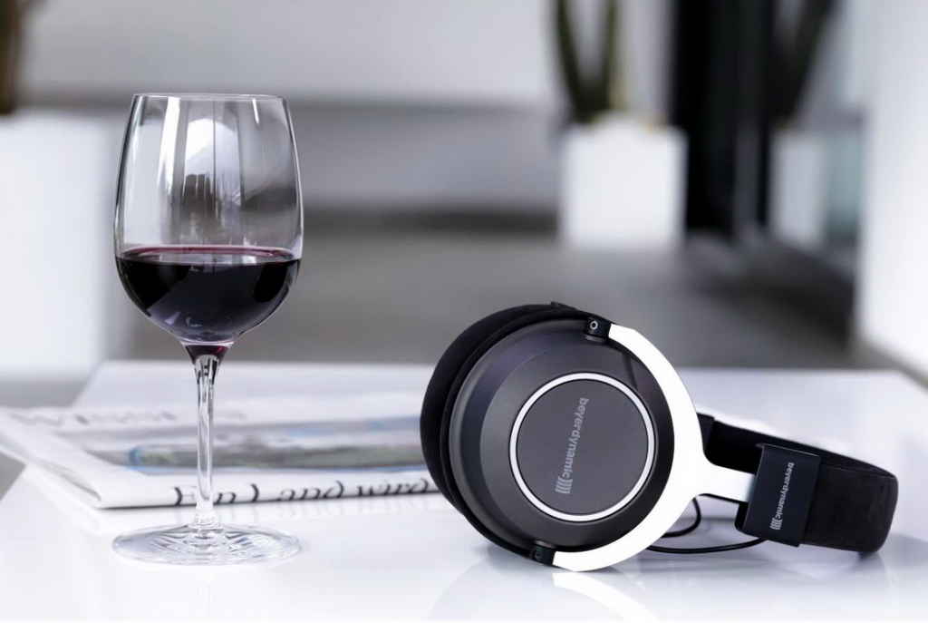 headphones_on_desk_with_wine_glass.jpg